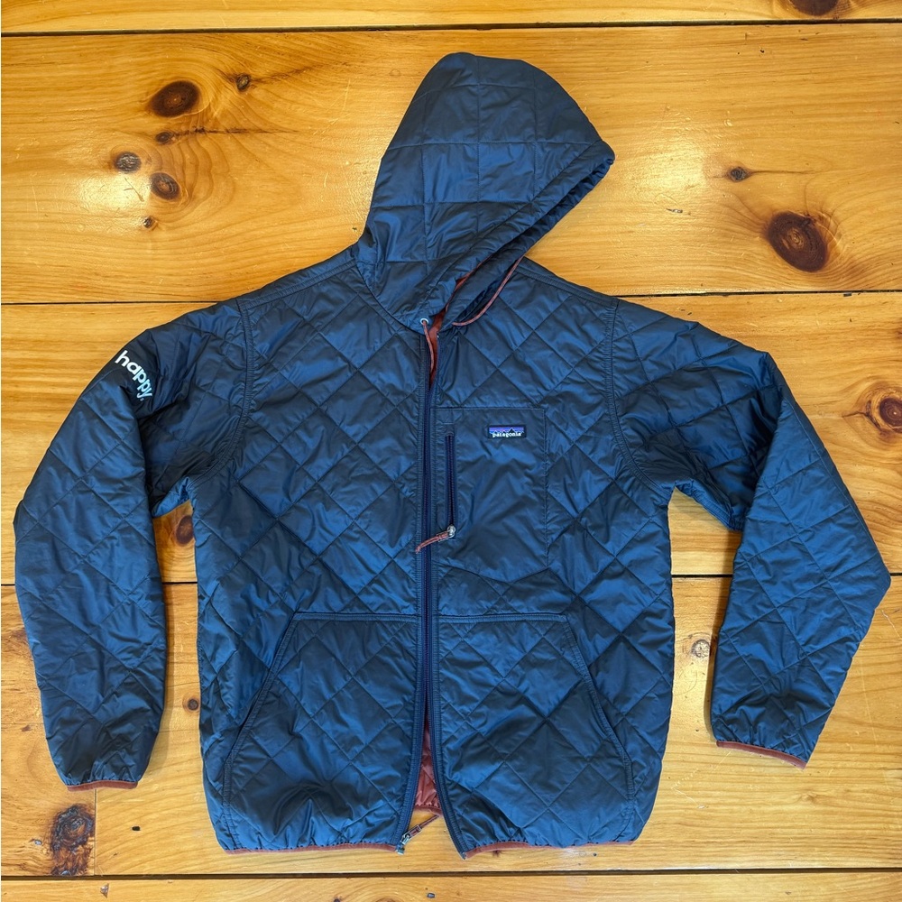 Patagonia Quilted Hooded Puffer Jacket - Dark Blue. Company Branded “Happy”